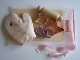 Our "Ballerina" baking set is wonderful for those little hands that love to bake. Each "Ballerina" baking set comprises of three hand chosen pastel pastry cutters ( pink duckling/lilac tulip/pink butterfly), a "Ballerina" baking glove and a mini beech rolling pin tied together in our own French and Floral bag. A wonderful gift for that special little girl! 
 Price: &pound;22.33