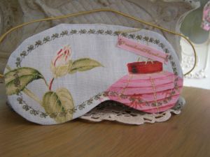 Our Raphi eye mask is comfortable...and delightful. Made using our Raphi fabric, we have co-ordinated it with 100% silk in pale yellow and dark green silk scalloped edge stitching.
 Price: &pound;10.58