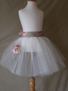 This Is Our Gorgeous "Vintage Rose" Tutu.

Made With Generous Amounts Of Double Layered Netting, A Small "Vintage Rose" Side Pocket And Finished With A Deep And Long "Vintage Rose" Waistband.

Each Tutu Can Be Worn Over Our Co-Ordinating Pinafore Dress. Great Over Jeans!
Sizes 2-9 years
 Price: &pound;22.00